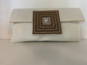 White clutch with Gold and Diamond Medallion